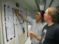 Tommi and Michihito discuss the placement of Michihito's work at the Media Lab Campus command centre<br>